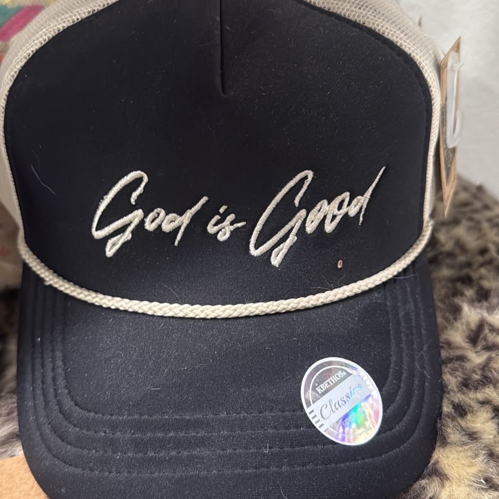 Black and Tan Trucker Hat with Embroidered Text